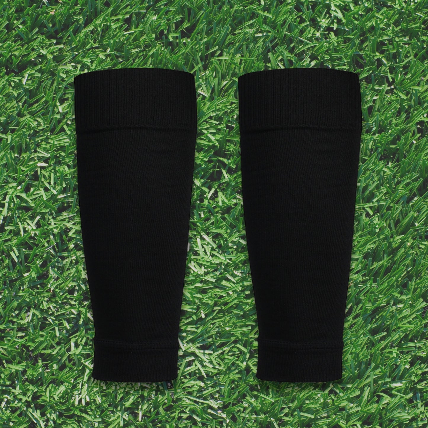 Voetbal afgeknipte sok. Pre cut sleeve voor voetballers. Zwart.